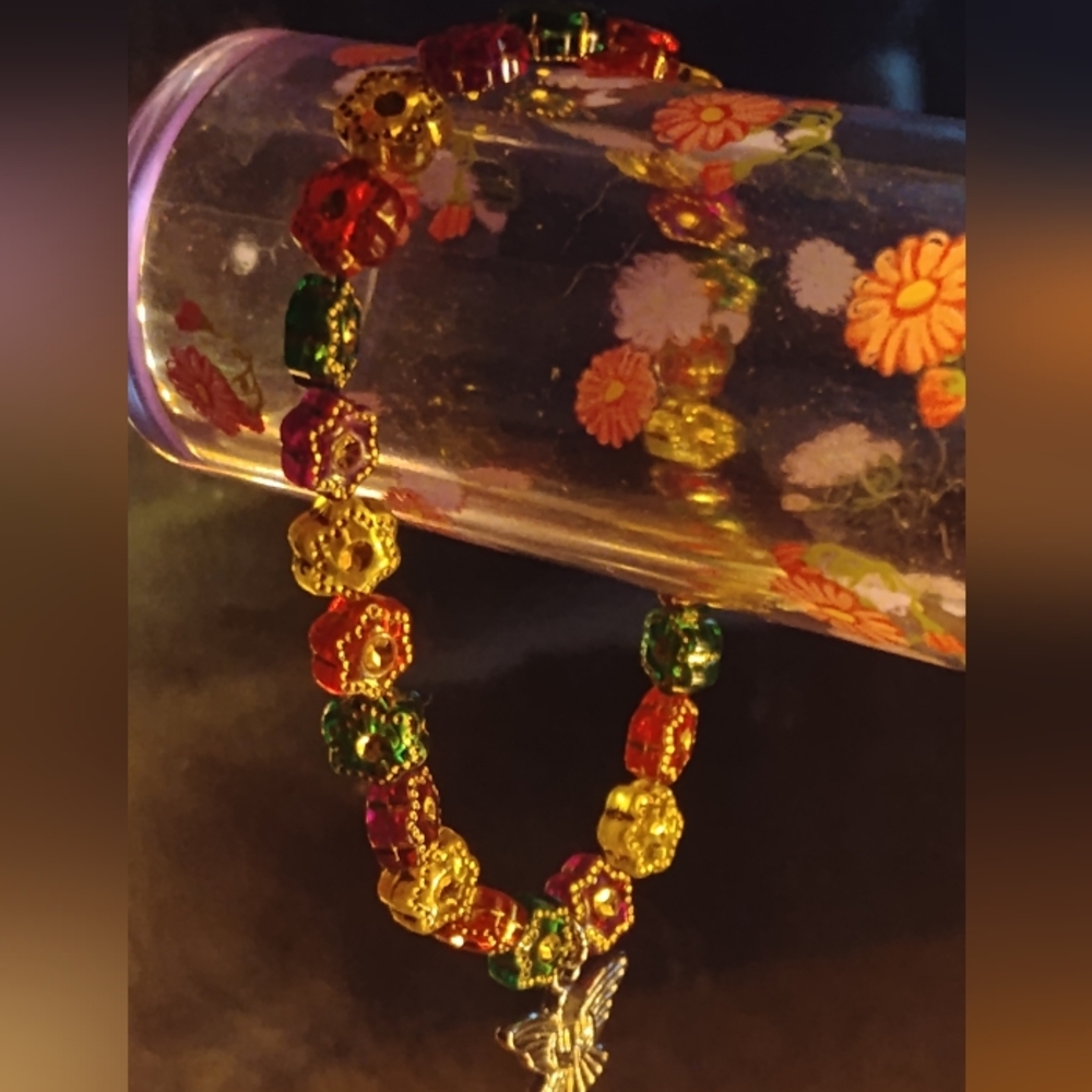 Red and Green Beaded Bracelet with Gold Accents